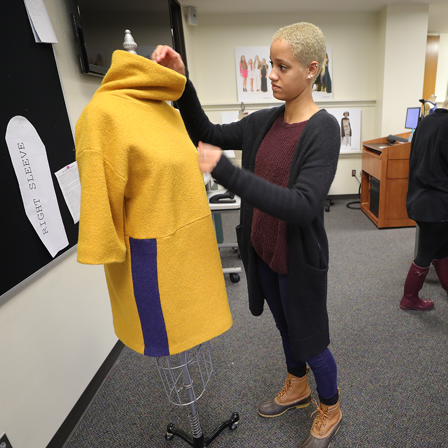 Human Sciences and Design Apparel student working with dress