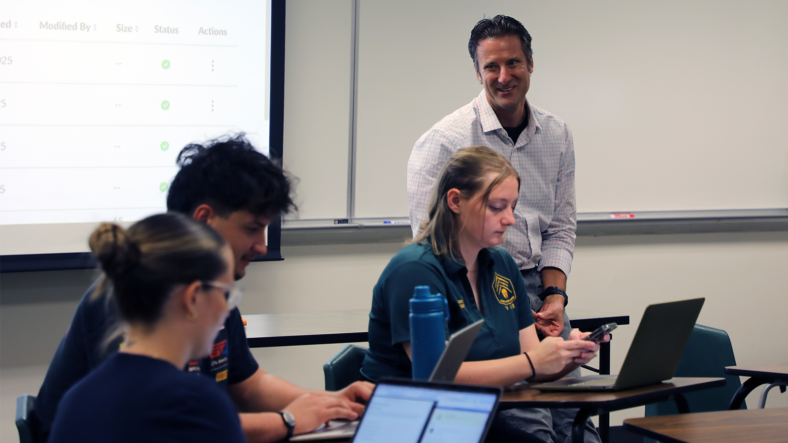 Andrew R. Meyer, PhD, leads a class discussion in his "Religion and Sport" course. 