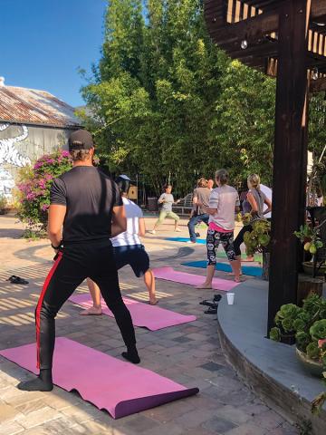 Clients at Barn Life Recovery participate in tai chi.