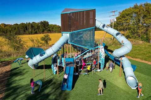 A play structure with several clear, spacious access points allowing children to have multiple route options that meet their ability and desired challenge.