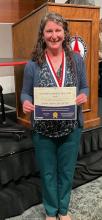 Heather Hudson with Certificate